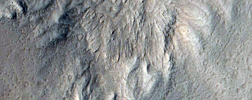 Well-Preserved 6-Kilometer Diameter Impact Crater Near Tinjar Valles