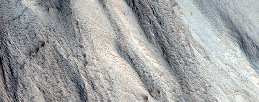 Eroded Scarp Near Terminus of Valleys on Western Hecates Tholus