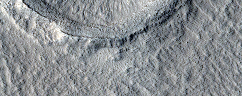 Recent Crater in Erebus Montes