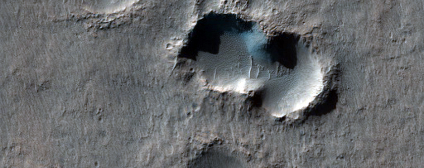 Albedo Monitoring in Arrhenius Crater