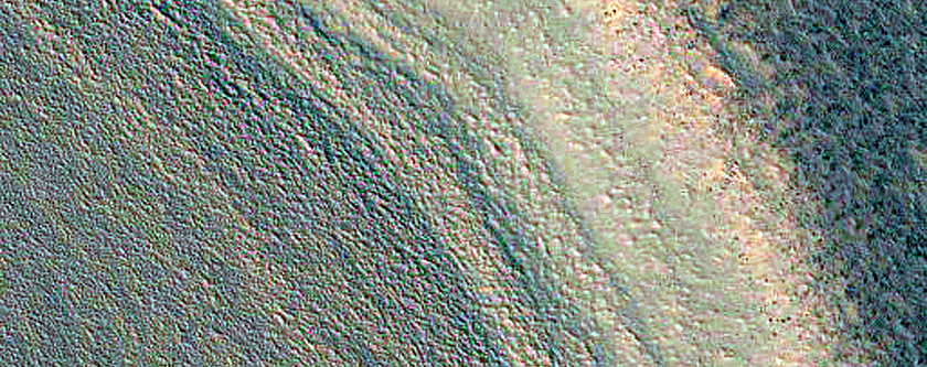 Small Crater and Scarp at Mouth of Chasma Boreale