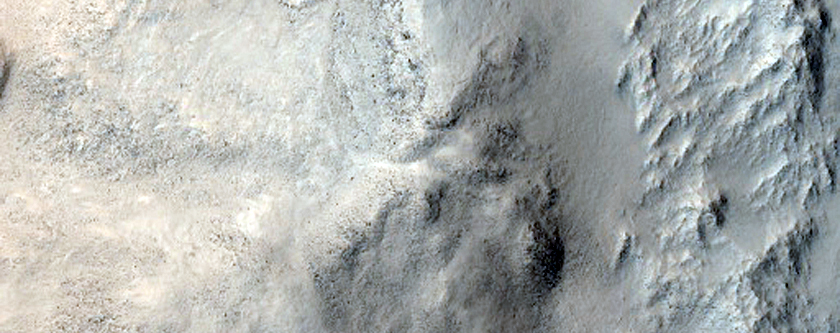 Possible Low-Calcium Pyroxene in Nilosyrtis Region Layers