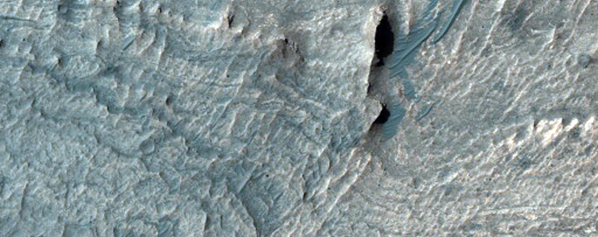 Monitoring Dark Dunes in Valles Marineris
