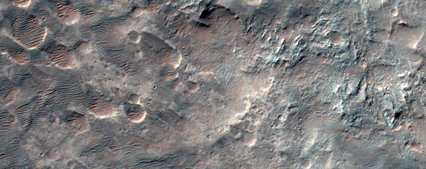 Crater with Fans and Layered Bedrock