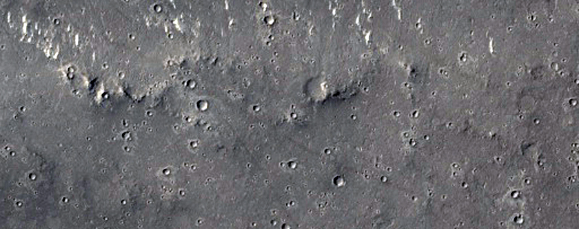 Flows and Small Mounds in and Near THEMIS Image V12115003