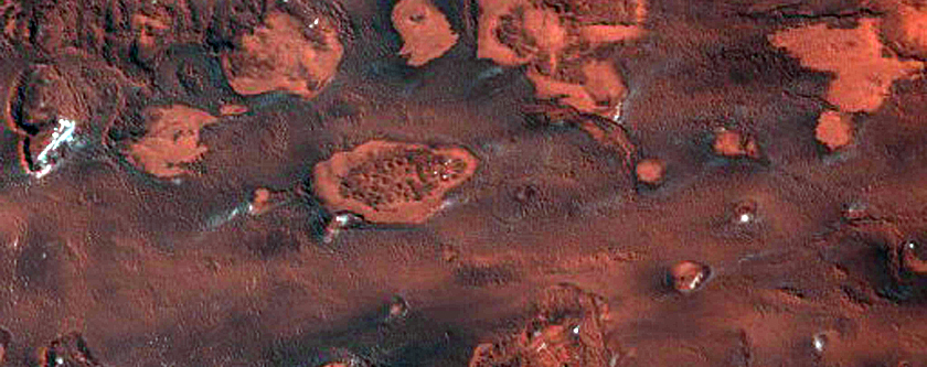 Marginal Ramparts within the Uppermost North Polar Layered Deposits