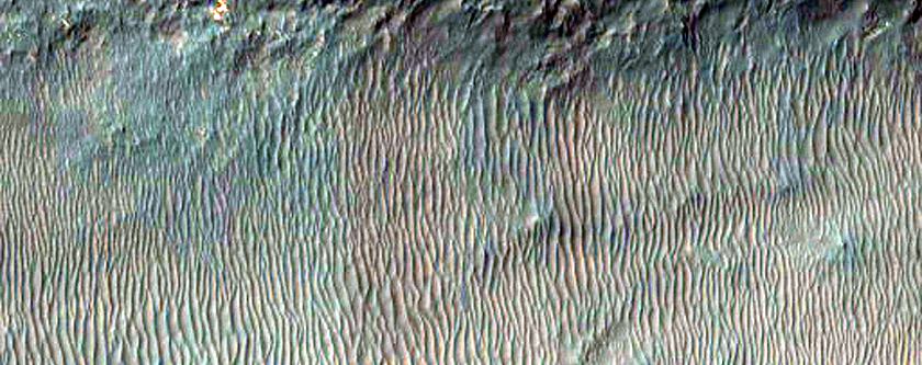 Possible Hydrated Silicates within Layered Deposits of Capri Chasma