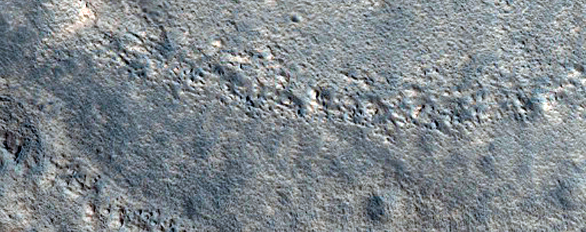 Crater in Mareotis Fossae in CTX Image G19_025718_2273_XN_47N064W