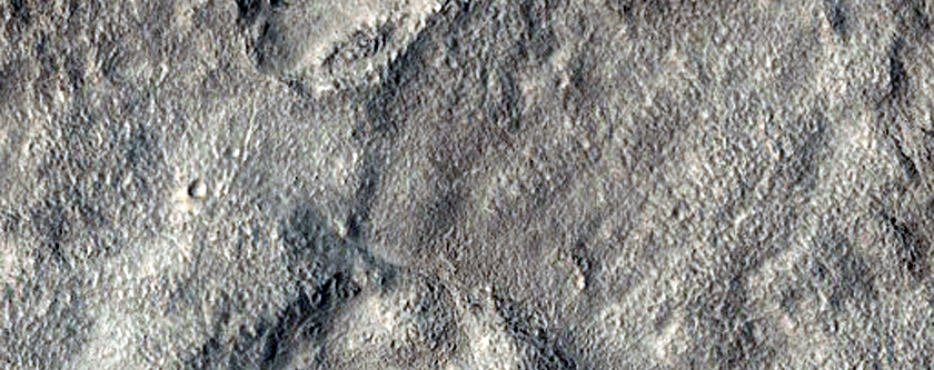 Pits and Cracks in Mid-Latitude Crater