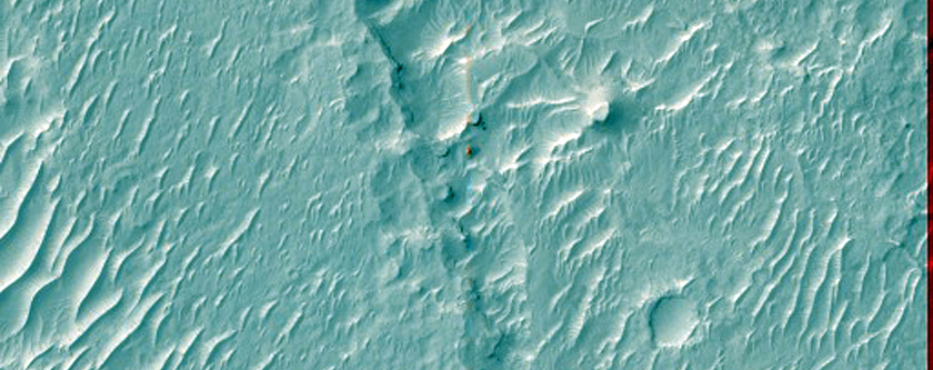 Edge of Buried Crater Showing Outcropping Layers