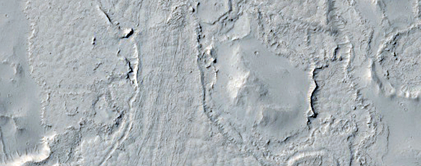 Interactions between Crater Ejecta Mantling Deposits and Flows