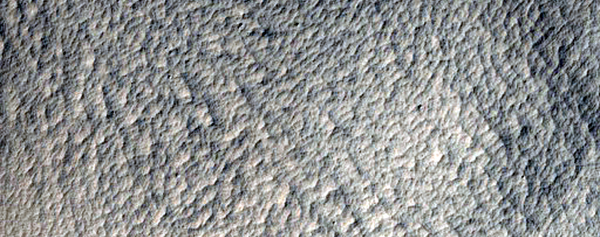 Central Peak Crater Superposed on Larger Crater Rim