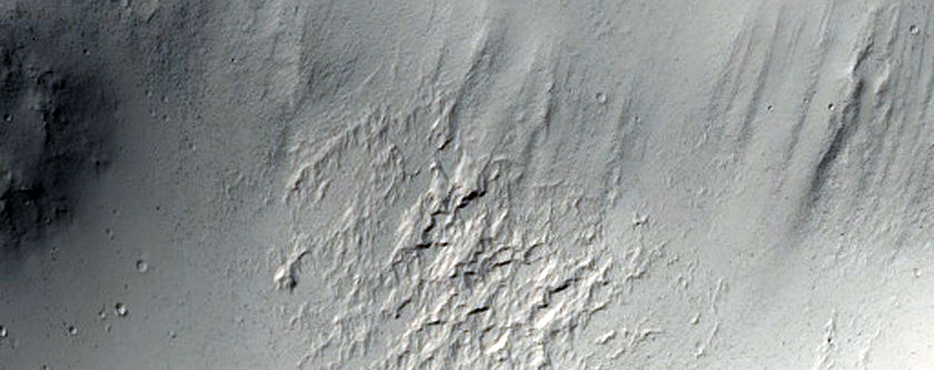 Crater Exposed Bedrock on South Flank of Apollinaris Mons