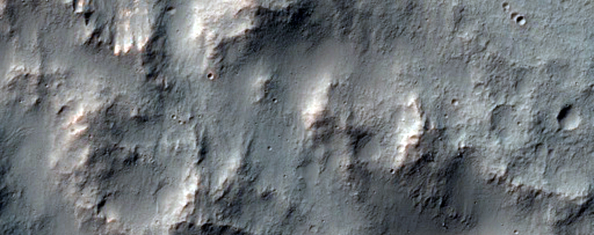 Light-Toned Material in Crater Ejecta