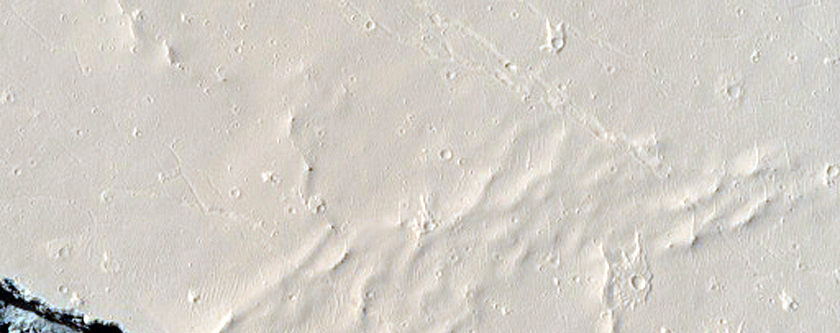 Crater or Pit Near Cerberus Fossae in MOC M07-02342