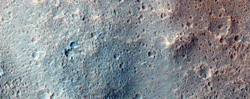 Flow Lobes Resting on the Elevated Platform of a Moated Crater