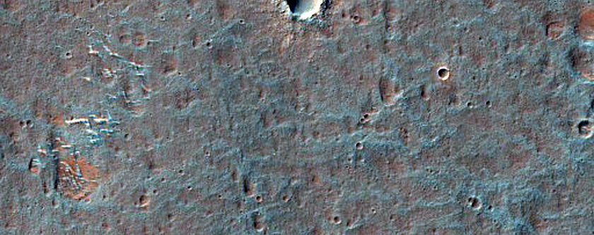 Light-Toned Unit with Low Thermal Inertia on the Floor of Eos Chasma