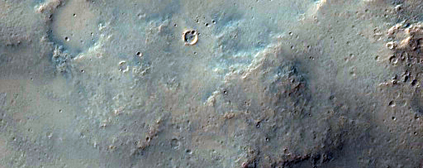 Mounds and Small Ridges along Wrinkle Ridge on Huygens Crater Floor