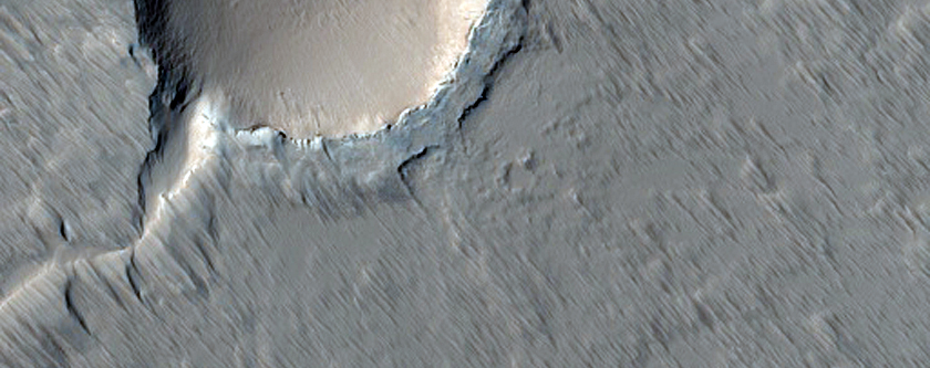 Faulted Shield Volcano with Summit Crater in Tharsis Region