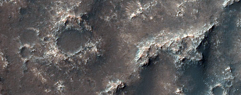 Monitor Dunes and Dark Material in Southwest Dawes Crater