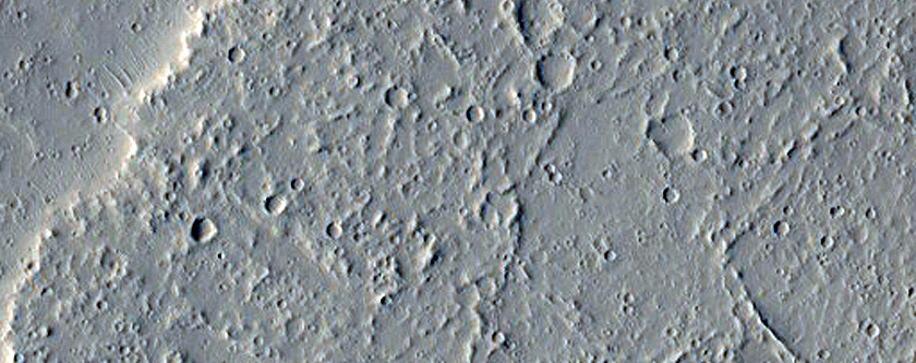 Small Shield in Tharsis Region Embayed by Younger Lavas