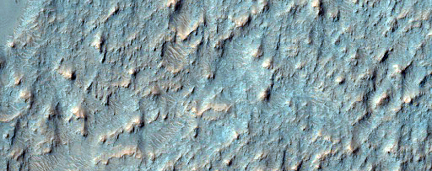 Possible Phyllosilicates and Fluvial Features Near Hashir Crater