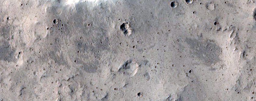 Tiny Crater on Rim of Larger Crater East of Maja Valles