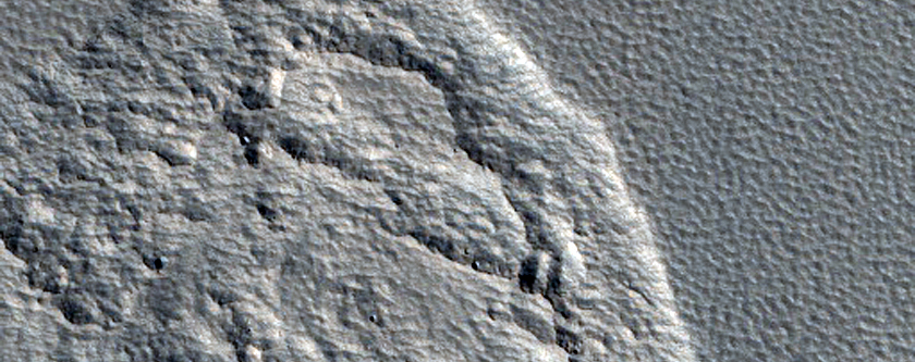 Scarp in Mantle Material in Milankovic Crater