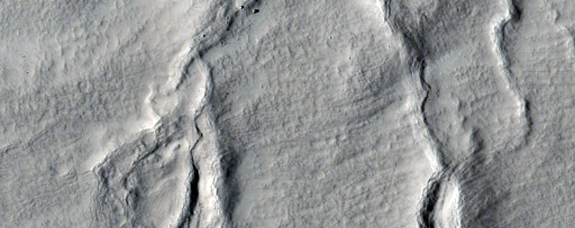 Distorted Icy Terrain in Nilosyrtis Mensae Crater
