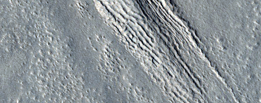 Pitted Floor of Crater in Phlegra Montes
