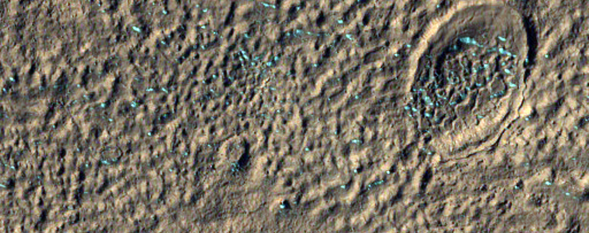 Layered Deposits in Crater in Hellas Montes Region
