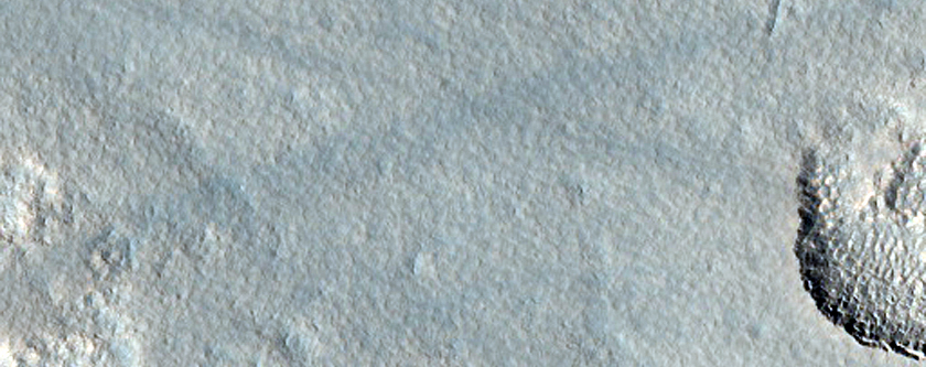 Pits on Crater Ejecta in Arcadia Planitia

