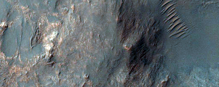 Bedrock Exposures in Wall of Crater on Rim of Terby Crater
