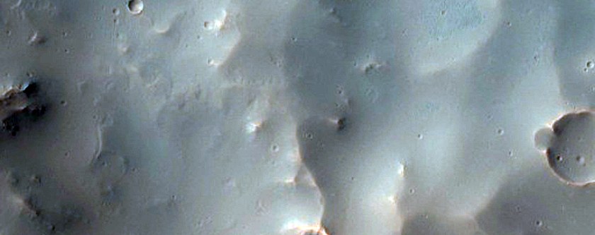 Well-Preserved 6-Kilometer Crater North of Coprates Chasma
