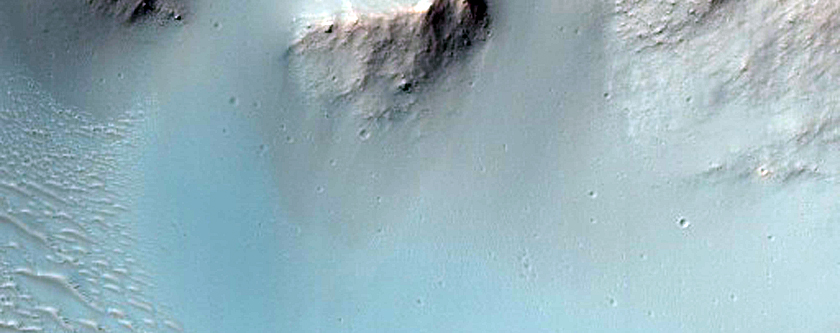 Impact Crater with Central Structure Near Tyrrhena Terra
