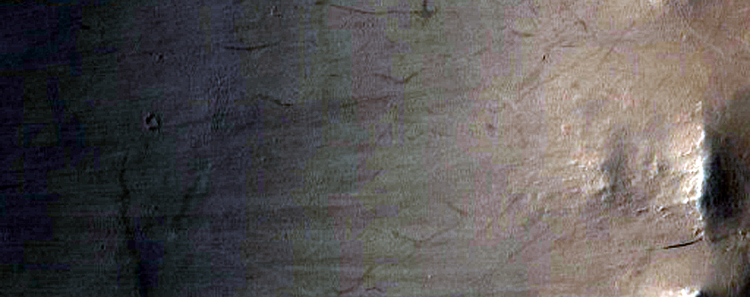 Slope Streaks on Crater Rim
