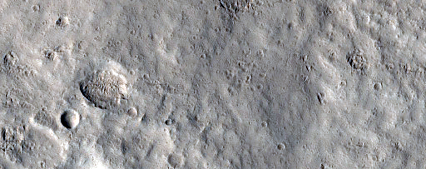 Crater Ejecta Overprinting Lava Rille
