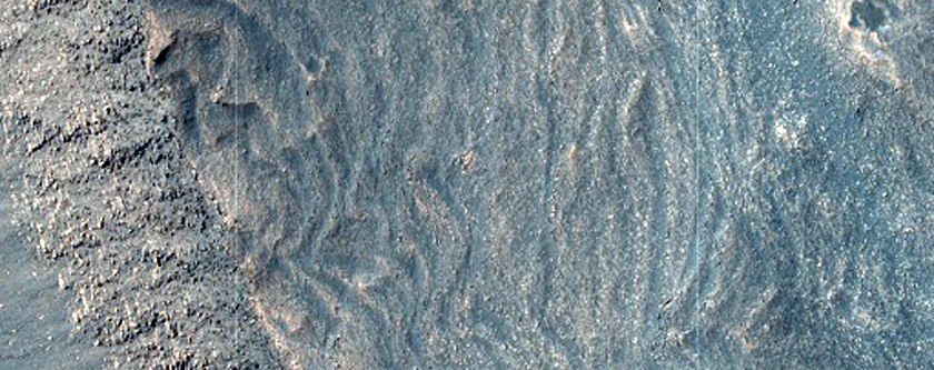 Light-Toned Stratified Materials in Melas Chasma
