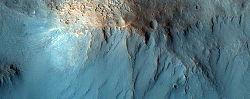 Ten Kilometer Crater with Unusual Ejecta
