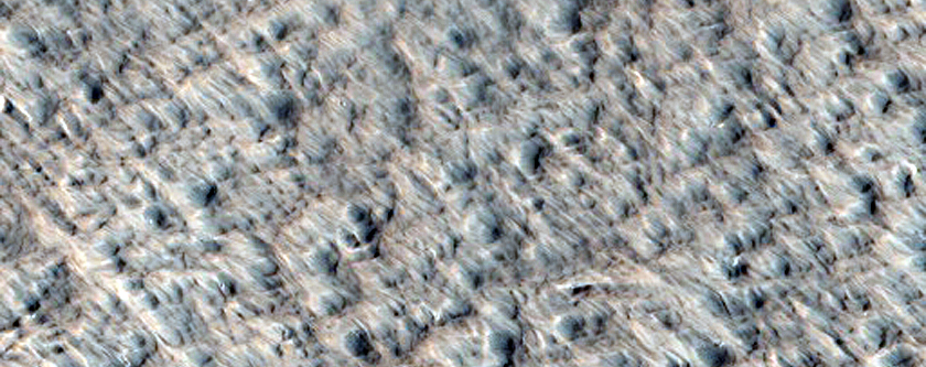 Small Crater with Bright Layer in Wall
