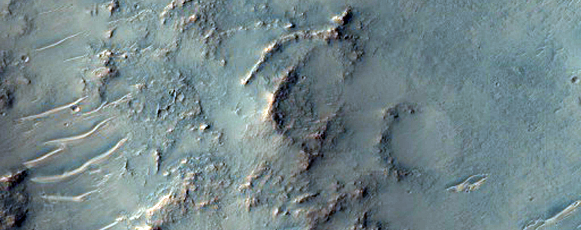 Deformed Crater on Huygens Crater Floor
