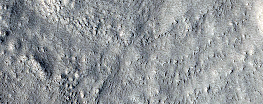 Crater with Rock Outcrops
