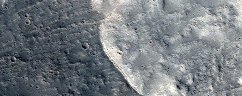 Erosion on Floor of Northern Mid-Latitude Crater
