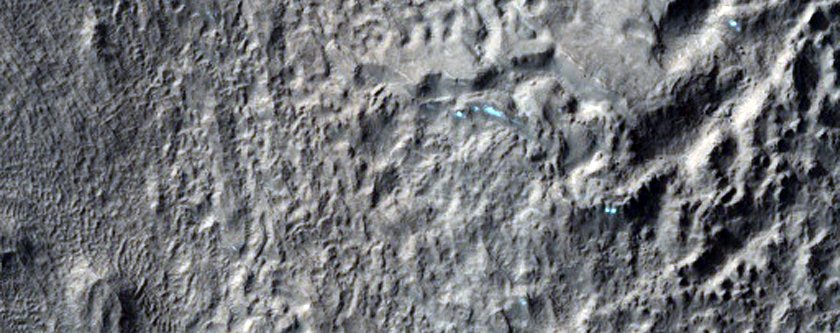 Layered Deposits in Crater in Terra Cimmeria
