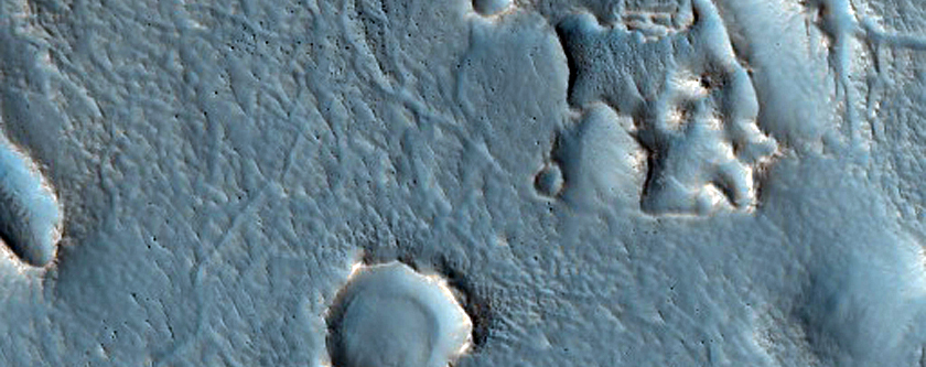 Ridges and Troughs South of Lyot Crater
