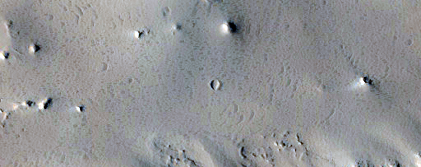 Possible Eroded Fluvial Features on Crater Floor
