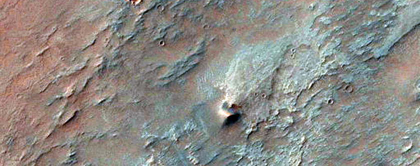 Central Structure in a 40-Kilometer Crater in Bosporos Planum

