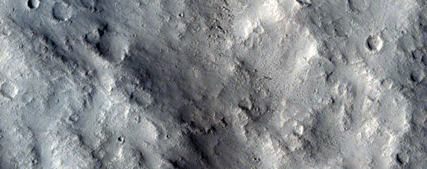 Pettit Crater Ejecta in Contact with Knobs and Massifs
