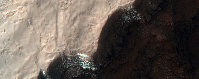 Volatiles and Gullies in Asimov Crater
