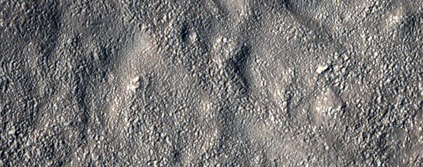 Layered Deposits in Crater in Hellas Montes Region
